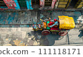 Aerial View of Colorful Rickshaw on Textured Streets in India 111118171