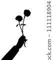 The arm of a man presenting a bouquet of vermilion marigolds 111118904