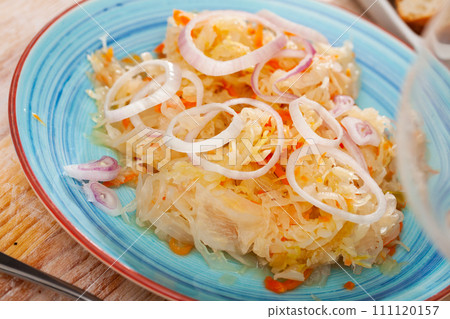 Homemade sauerkraut with onion 111120157