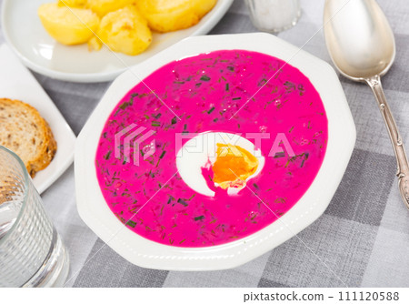 Delicious cold yogurt beetroot soup Holodnik with cucumber decorated by egg Delicious cold yogurt beetroot soup Holodnik with cucumber decorated by egg 111120588