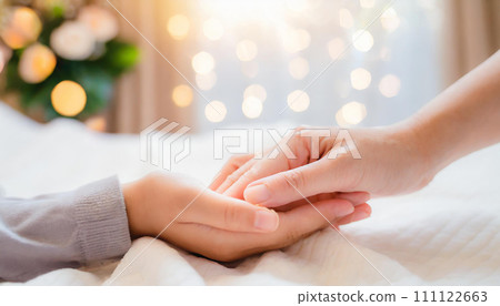 Parent and child holding hands 111122663