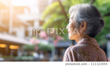 Profile of a senior woman, close-up of a smiling elderly Japanese person Profile of a senior woman, close-up of a smiling elderly Japanese person 111122854
