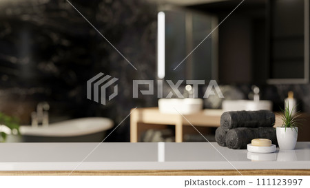 A space for displaying your product on a white table in a modern black bathroom. 111123997