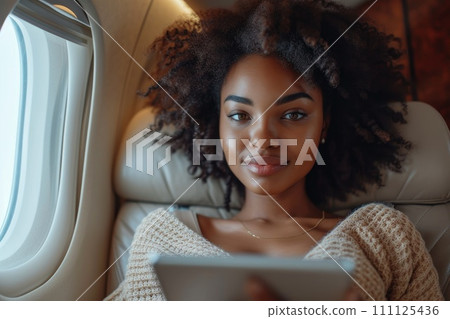AI-generated content. Business people working with digital tablet on aeroplane. Generative AI 111125436