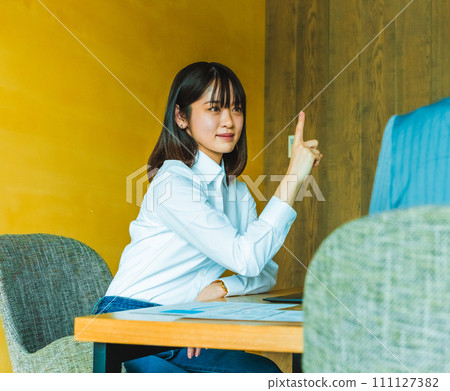 Casual business people having a meeting Casual business people having a meeting 111127382