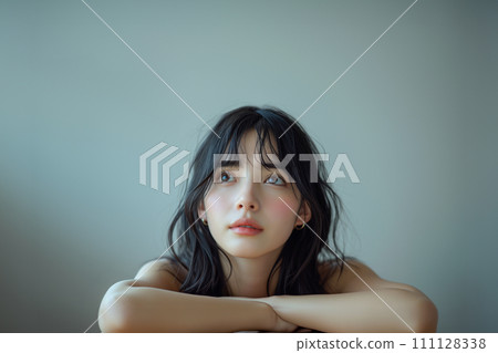 Portrait of a worried woman 111128338