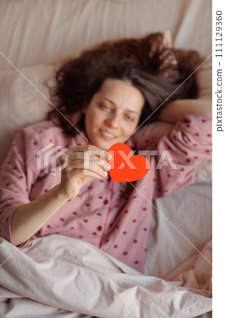 congratulations on postcard in morning. red card in form of heart for Valentine's Day congratulations on postcard in morning. red card in form of heart for Valentine's Day 111129360