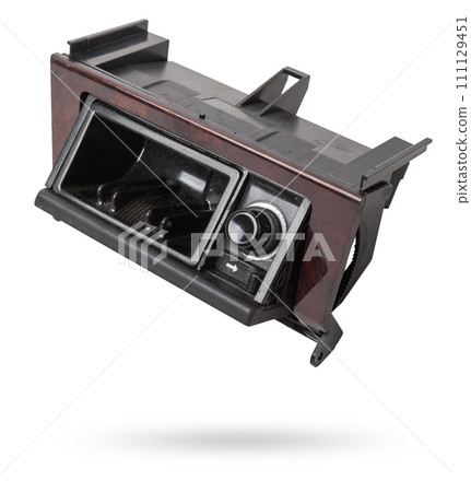 An opened ashtray from panel of car interior separately on a white isolated background with wooden decorative overlay. 111129451