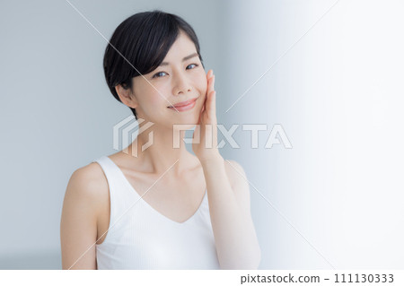 Beauty image Portrait of a woman wearing a tank top 111130333