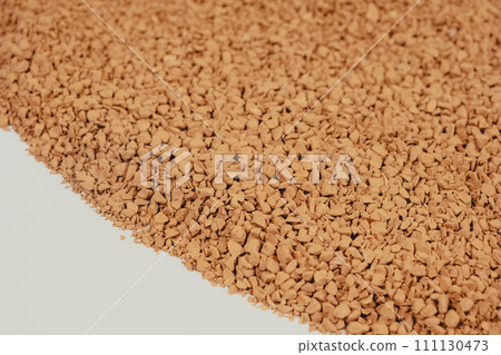 Background of freeze-dried granulated instant coffee macro close-up. Background of freeze-dried granulated instant coffee macro close-up. 111130473