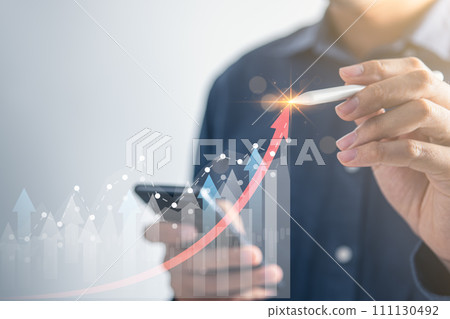 Businessman pointing  financial graph for business investment growth. Financial, data analysis, goal,success and money concept. 111130492