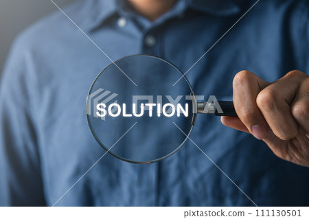 Businessman using magnifier find out the solution. root cause and solution concept. 111130501