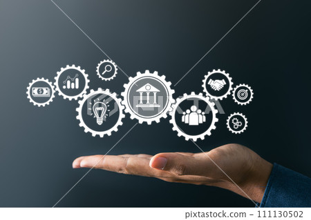 Businessman holding bank and other finance icons. financial,insurance and business investment concept. 111130502