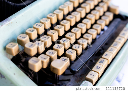 Antique typewriter cyrillic keys close up and russian keys selective focus Antique typewriter cyrillic keys close up and russian keys selective focus 111132720