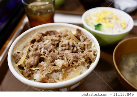 A large bowl of beef bowl ordered at a beef bowl restaurant A large bowl of beef bowl ordered at a beef bowl restaurant 111133849