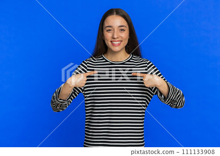 Caucasian woman feeling proud pointing herself overjoyed by success making choice self-confident 111133908