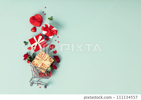 Valentine's day concept. Shopping trolley with gift boxes Valentine's day concept. Shopping trolley with gift boxes 111134557