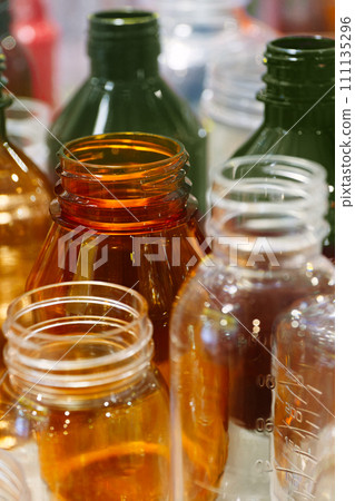 Empty multicolor transparent plastic bottles 111135296