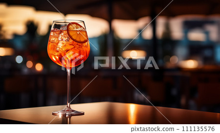 Glass of ice cold Aperol spritz cocktail. 111135576