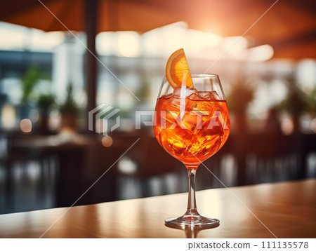 Glass of ice cold Aperol spritz cocktail. 111135578