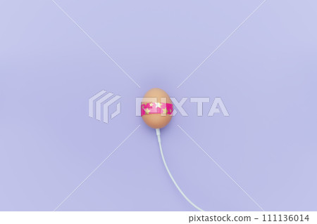 Charging decorated egg with white cable. Loading Easter Copy space simple pastel rustic background for traditional Easter holiday card 111136014