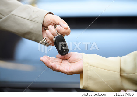 Senior couple car keys in hand 111137490