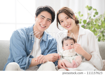 Young family, dad and mom holding baby Young family, dad and mom holding baby 111137623