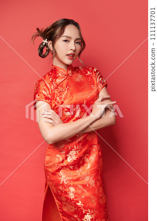Asian chinese woman in traditional dress on red background. Chinese new year festival, 111137701