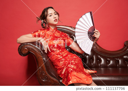 Asian chinese woman in traditional dress on red background. Chinese new year festival, Asian chinese woman in traditional dress on red background. Chinese new year festival, 111137706