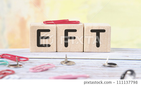 EFT text written on wooden cubes on a light colored background EFT text written on wooden cubes on a light colored background 111137798