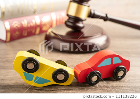 Hammer gavel judge with car vehicle accident, insurance coverage claim lawsuit court case. 111138226