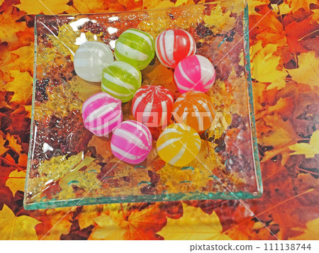 Nostalgic and delicious colorful candies arranged in a glass plate 111138744