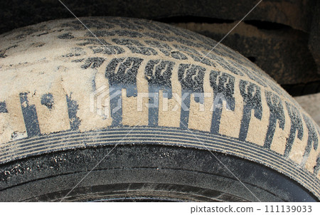 Dirty car tire treads clogged with sand side view detailed stock photo 111139033