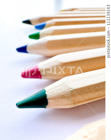 Wooden colorful ordinary pencils isolated on a white background Wooden colorful ordinary pencils isolated on a white background 111139163