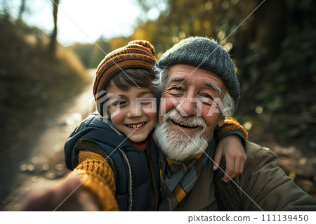 Happy senior man taking a selfie with grandson 111139450