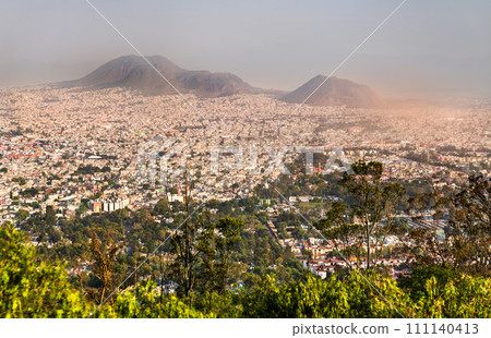 Panoramic view of a volcanic ridge in Mexico City from Cerro de la Estrella National Park in Mexico Panoramic view of a volcanic ridge in Mexico City from Cerro de la Estrella National Park in Mexico 111140413