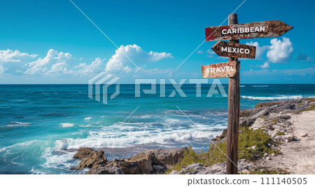Sign pointing to the direction of Mexico with scenic beach and ocean in the background 111140505
