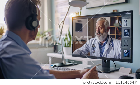 Telemedicine doctor inspecting patients health complaints about health over the internet webcam 111140547