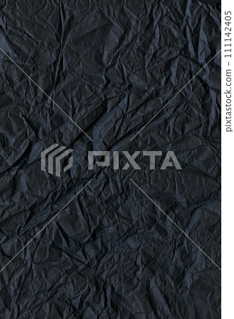 Dark crumpled paper texture. Minimalistic background. Charcoal paper backdrop. Noir cardstock pattern. Enigmatic textured backdrop. Deep matte black paper. Dark crumpled paper texture. Minimalistic background. Charcoal paper backdrop. Noir cardstock pattern. Enigmatic textured backdrop. Deep matte black paper. 111142405