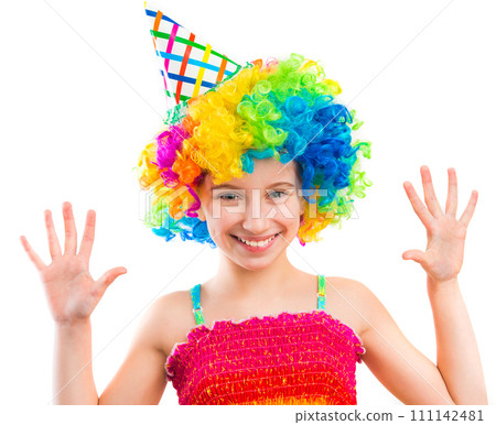 Little funny girl in clown wig showing her palms out isolated on white background 111142481