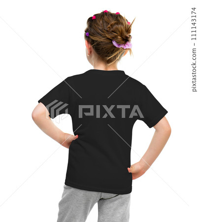 little girl on black t-shirt isolated on a white background, back view 111143174