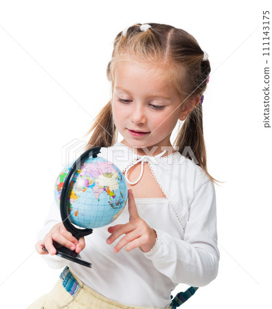 Curious little girl with globe isolated on a white background 111143175