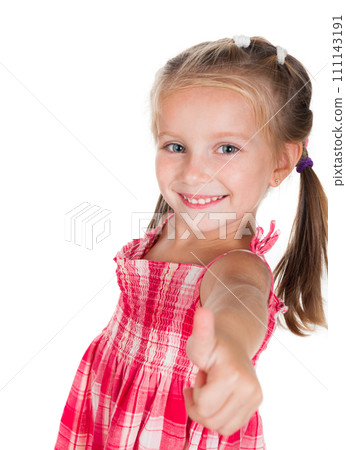 Smiling little girl showing thumb up isolated on a white background Smiling little girl showing thumb up isolated on a white background 111143191