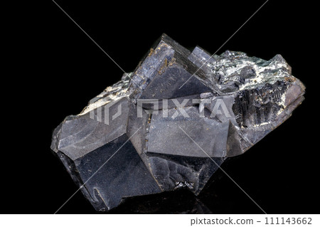 Macro stone mineral Galena on a black background 111143662