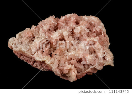 Macro stone mineral pink quartz amethyst on a black background Macro stone mineral pink quartz amethyst on a black background 111143745