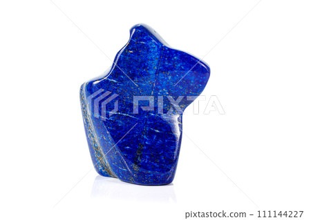 Macro of a mineral stone Lazurite on a white background Macro of a mineral stone Lazurite on a white background 111144227