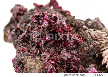 Macro stone Erythrite mineral on white background 111144272