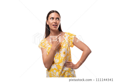 young attractive brunette woman looks away in surprise 111144341