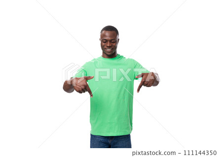 young smart african man dressed in green t-shirt and jeans young smart african man dressed in green t-shirt and jeans 111144350