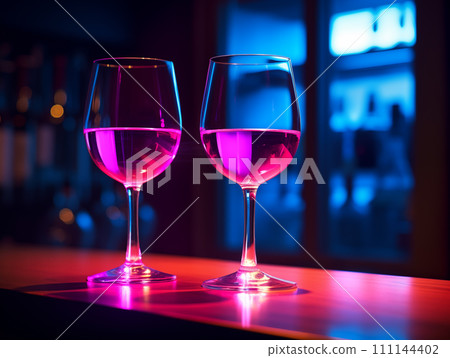 Two glasses of wine on a bar counter Two glasses of wine on a bar counter 111144402